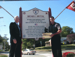 BC Coach Jerry York and Mike at the dedication of a sign honoring Mike in his home town of Avon, Massachusetts.